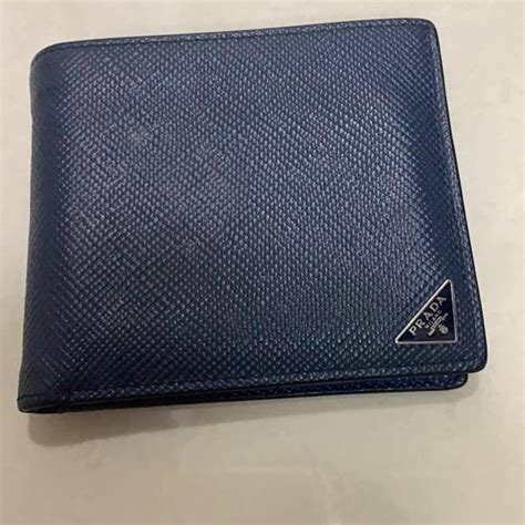 prada blue wallet male yellow|Prada billfold wallet.